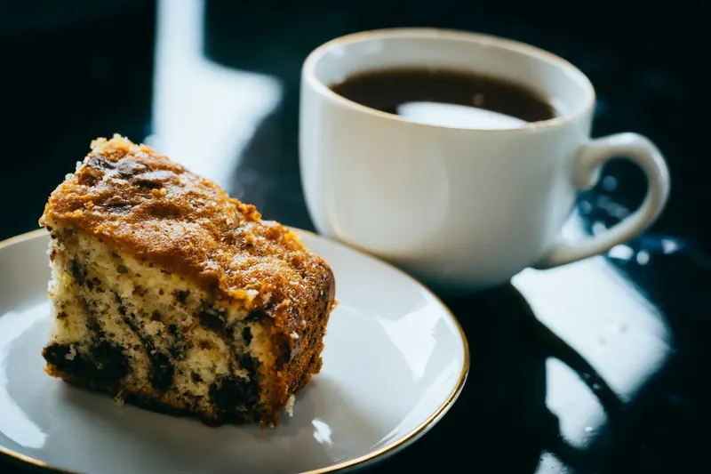 Coffee cake with a cup of coffee